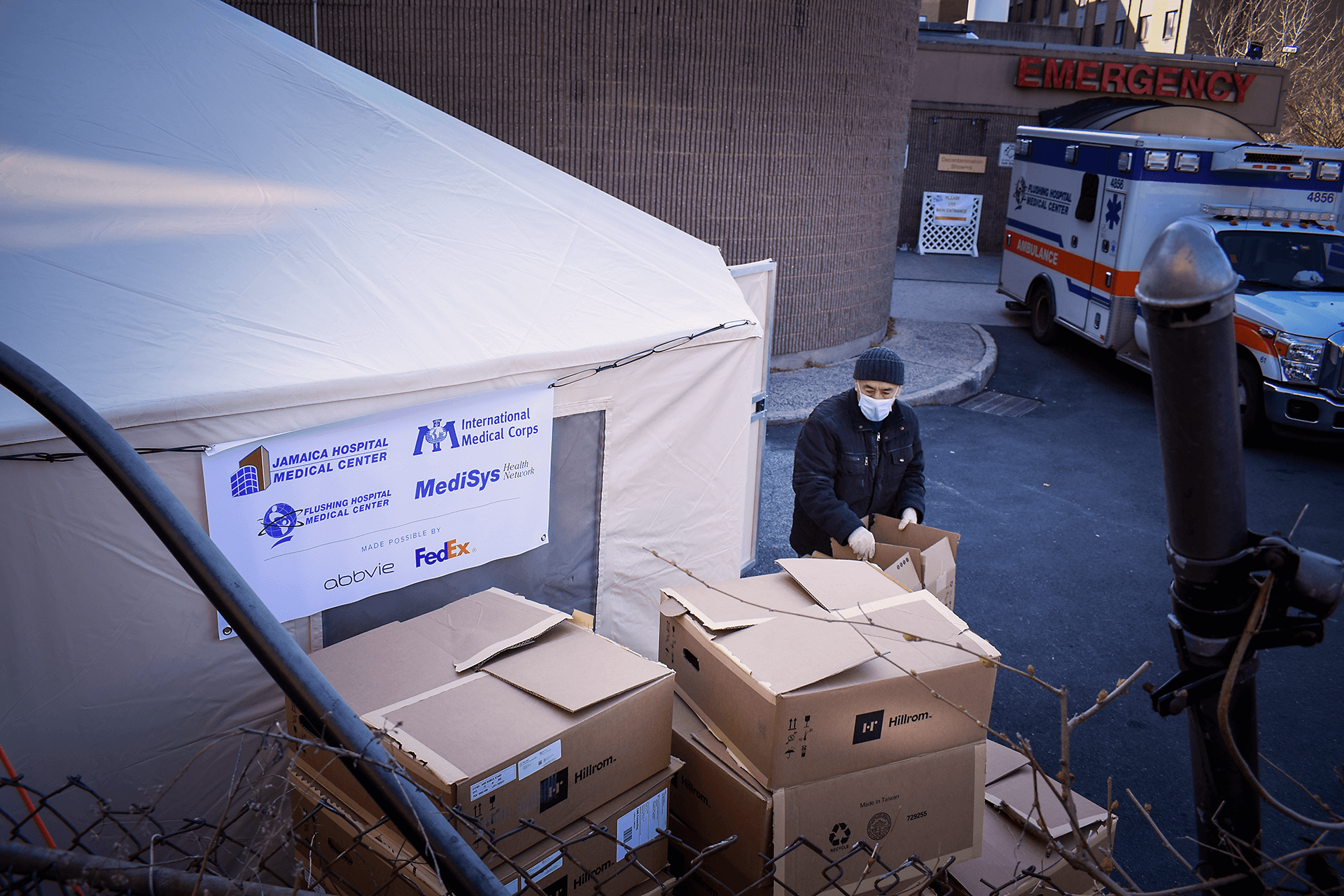 International Medical Corps’ team processes a delivery to Jamaica Medical Center of COVID-19 supplies, including gowns, nitrile gloves, face shields and face masks. To date, International Medical Corps has delivered 4 million items of PPE across the US.