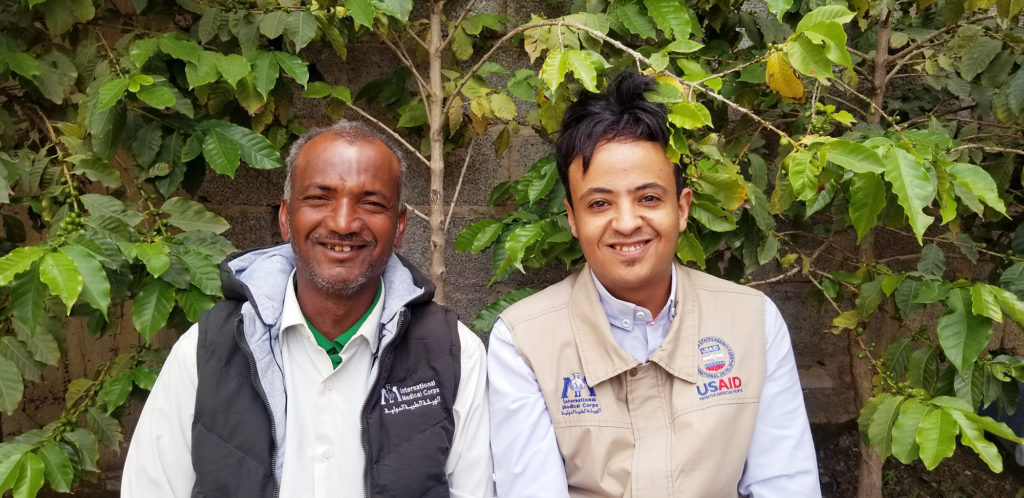 Fayad Al-Derwish (right), Senior Officer for Water, Sanitation and Hygiene (WASH) programming in Yemen’s southern governorates, with Mohammed Mahyoub, an International Medical Corps Community Health Worker, who now lives and works at the Al-Shorman IDP Camp in Taizz Governorate after armed conflict forced him and his family to flee their home elsewhere in the governorate.