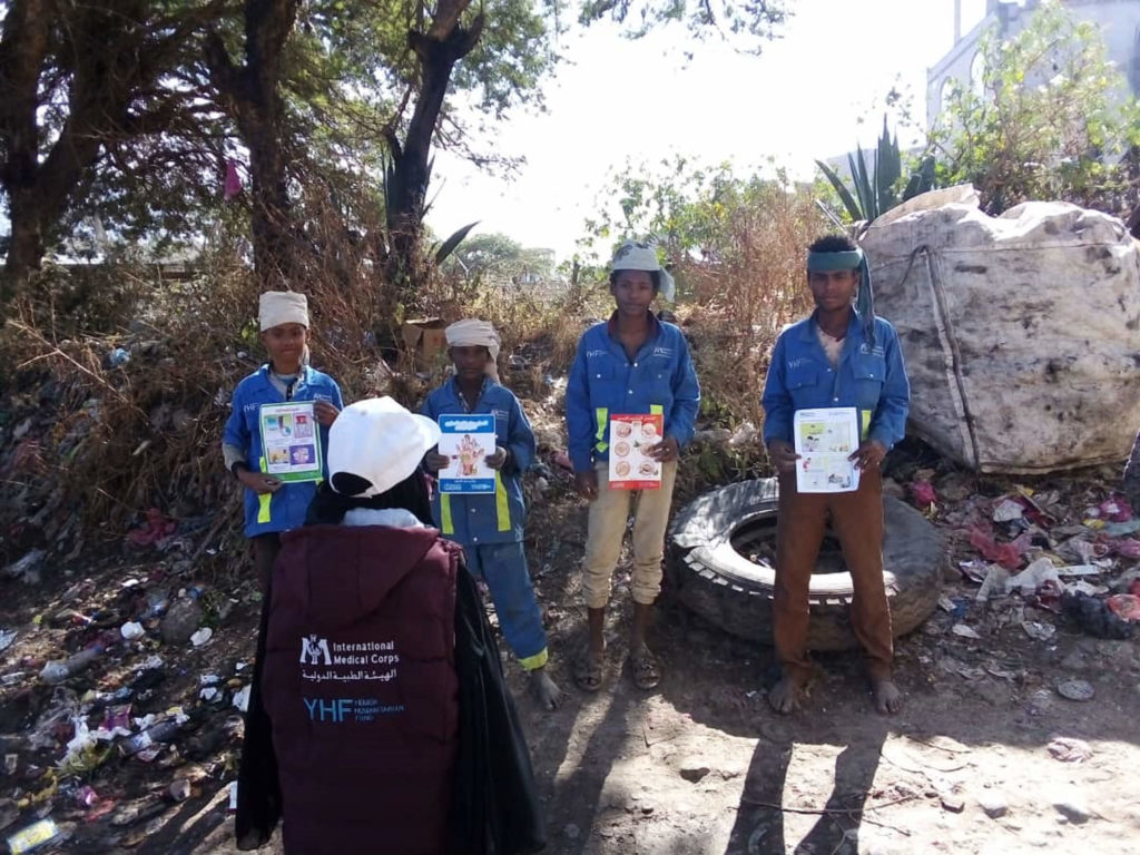 Community health volunteer Rezkallah Saleh teaches villagers in Ibb governorate the of importance of good hygiene.