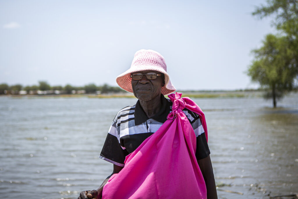 Community leader Charles Chol, 72, poses for a portrait in Aburoch, South Sudan, on March, 18, 2021. Originally from Malakal he now lives in Aburoch as an IDP.