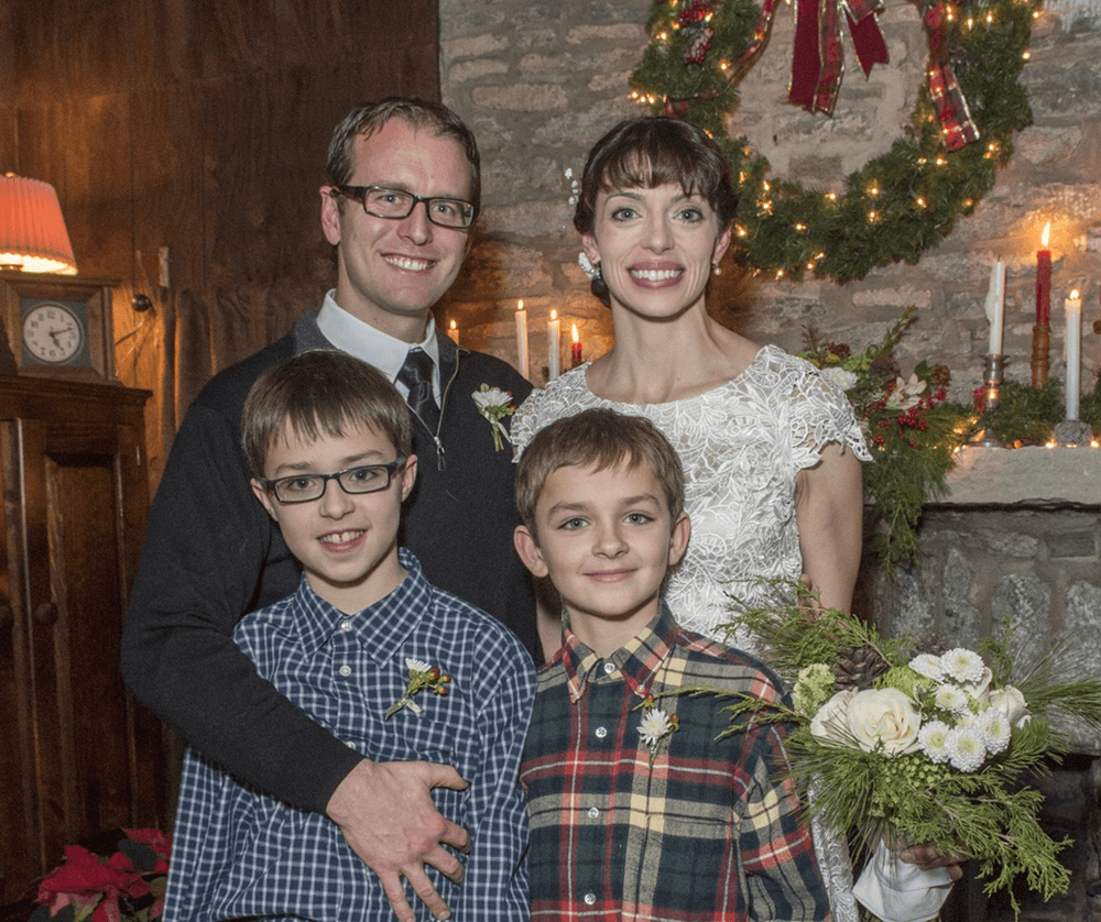 Emile and Greg on their wedding day with Emilie's sons, whom Greg subsequently adopted.