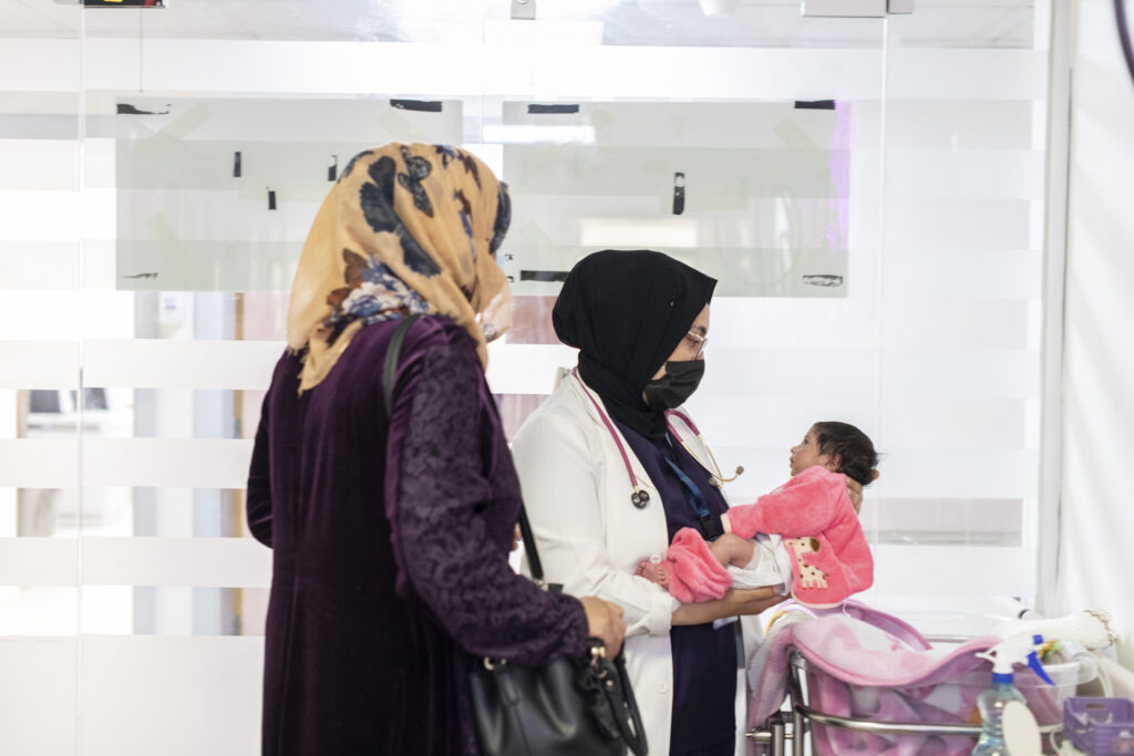 International Medical Corps doctor giving baby Sadeen a check up at the International Medical Corps - NICU unit in Irbid Specialty Hospital, Irbid, Jordan.