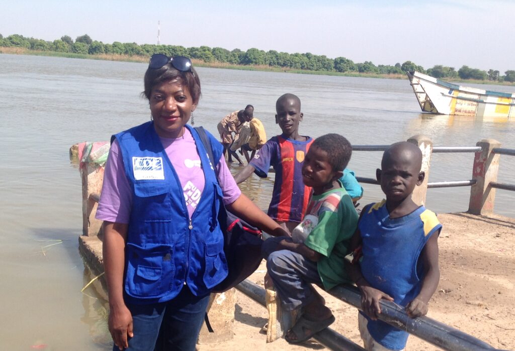 Dr. Dissake with children in the Mada health district, near Lake Chad in Cameroon.