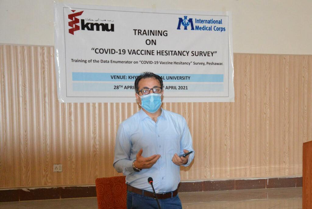 Dr. Khalid Rehman trains data collectors for our vaccine hesitancy survey.