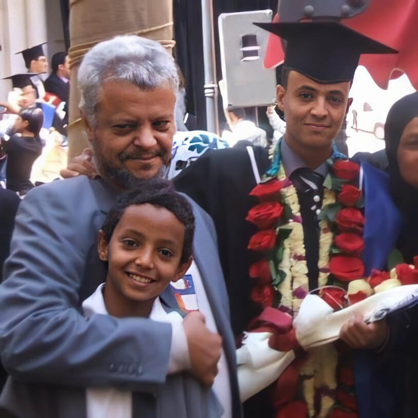 Fayad with his father and younger brother at Fayad’s graduation from Sana’a University, in 2014.