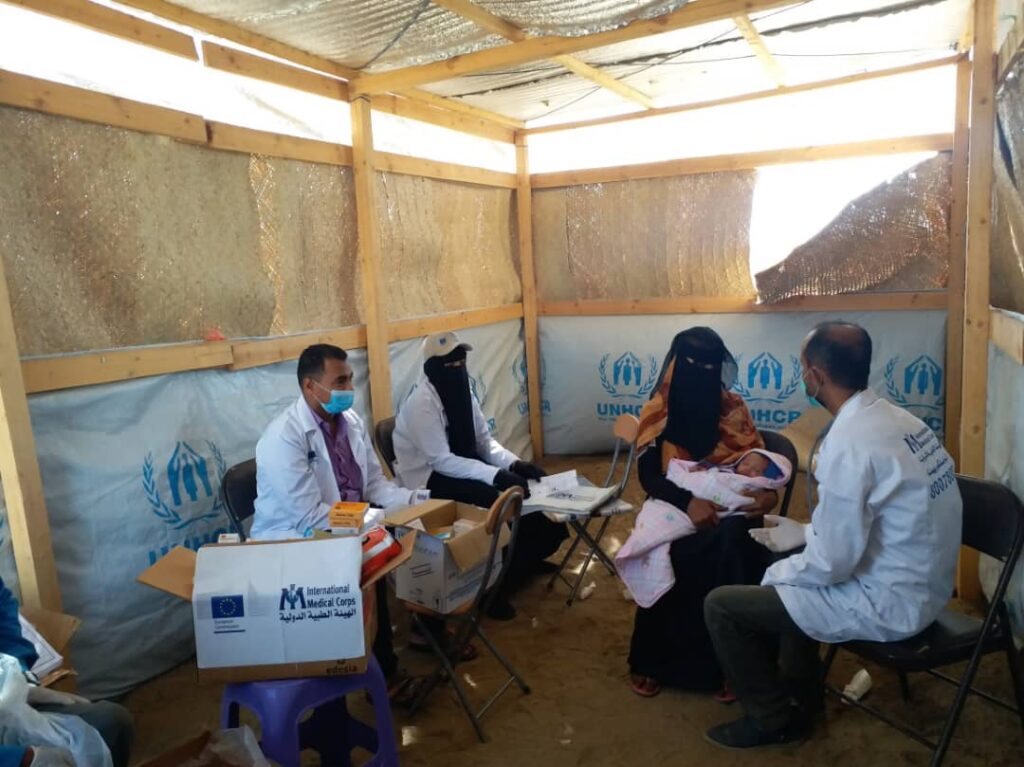 Our mobile health and nutrition team members screen and treat patients at a displacement camp in southwestern Yemen.