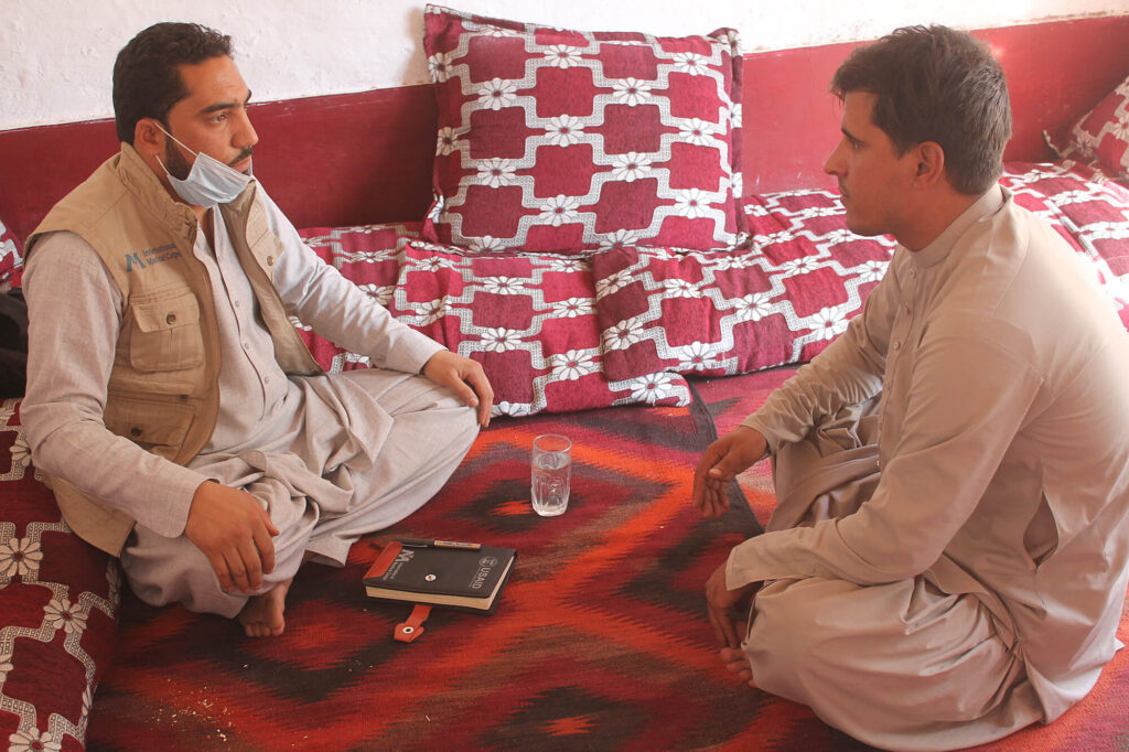 Ahmad Shah and an International Medical Corps MHPSS counselor during their session.