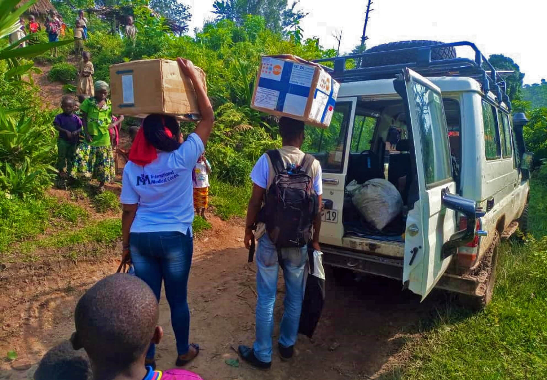 International Medical Corps staff transport medicines and other supplies to a mobile clinic in Fizi, South Kivu.