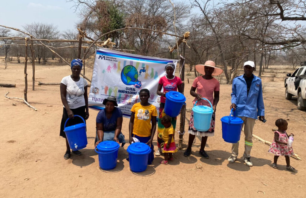 Community health club members receive their prizes in Binga District.