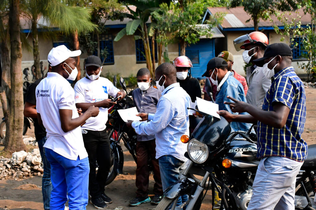 Arthur Amani conducts a sensitization activity for taxi drivers, teachers and journalists.