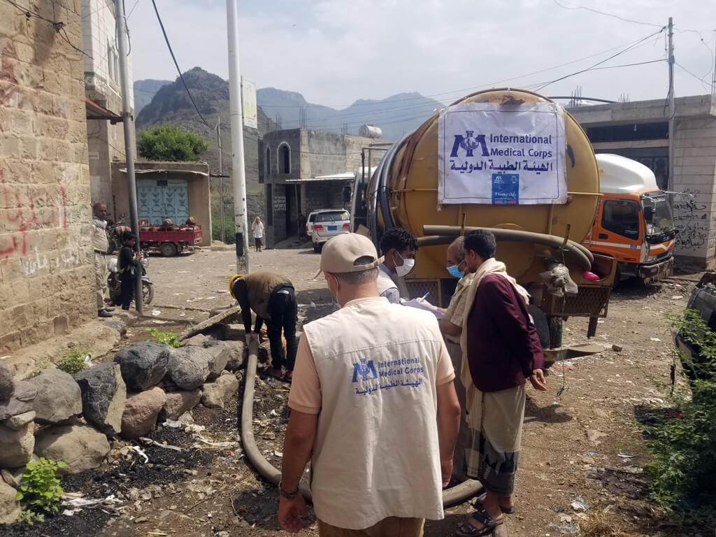 The WASH team cleans overflowing cesspits of household latrines in Al Qafr.