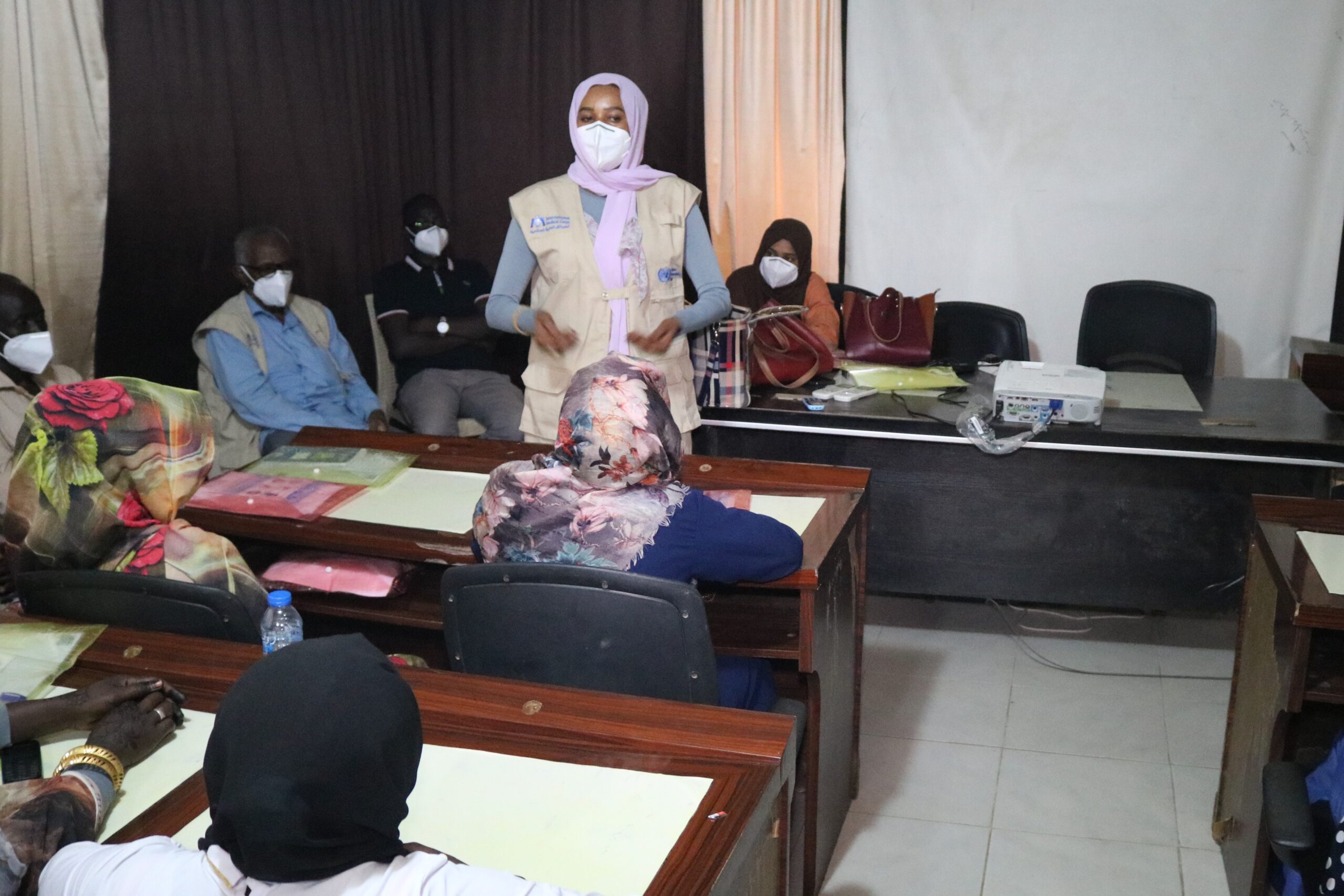 Rania Mohammed Abdalrahman Mohammed leads an infection prevention control training for clinic staff in Ad-Damazin, Sudan.