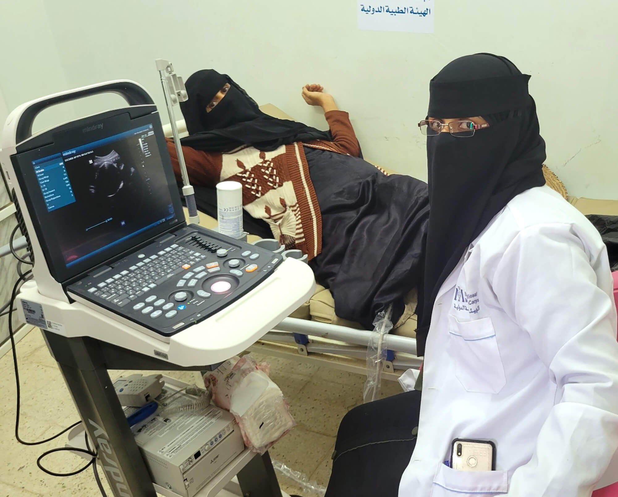 Midwife technician Ebtisam Al-Zaidi examines a pregnant woman at a health centre in Yemen.