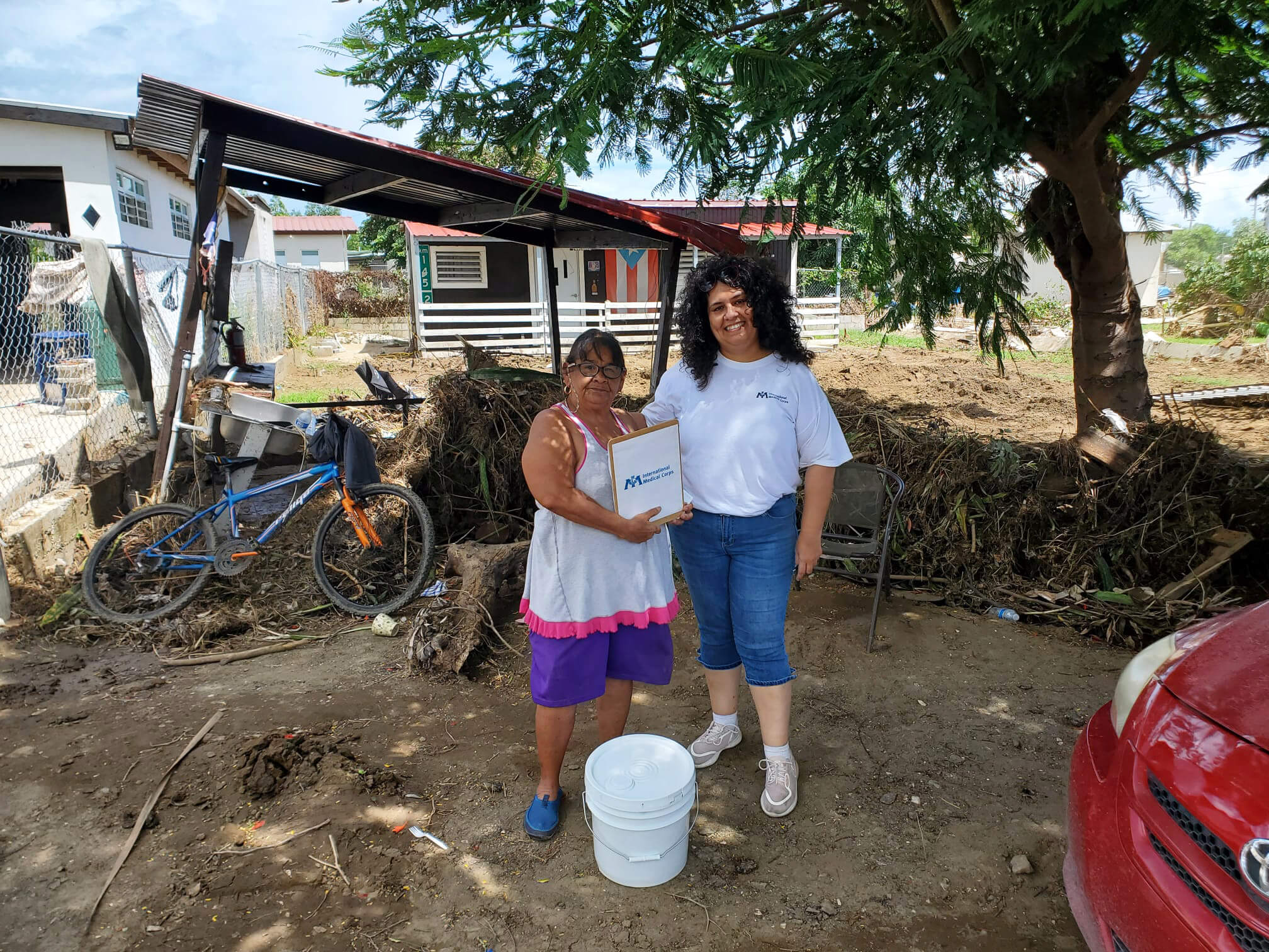 Nelida (left) is one of the people in the Salinas municipality of Puerto Rico whom we provided care to after 2022’s Hurricane Fiona. Though “the water destroyed everything,” Nelida told our teams how grateful she was to receive our support, saying, “You arrived at a precious moment. You and others came to help and provide medical care. Medically speaking, this community was destroyed.”