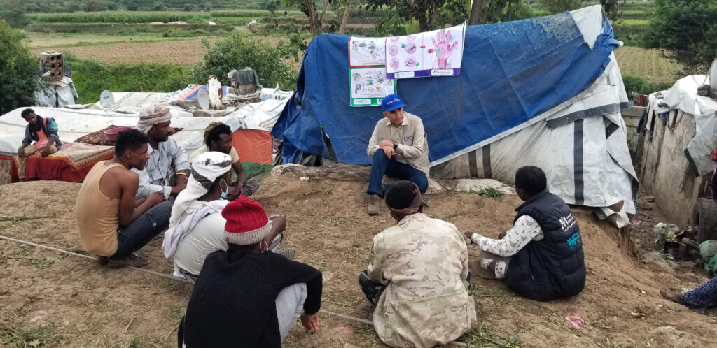 Esmail conducts a hygiene promotion session and focus group discussion at an IDP camp.