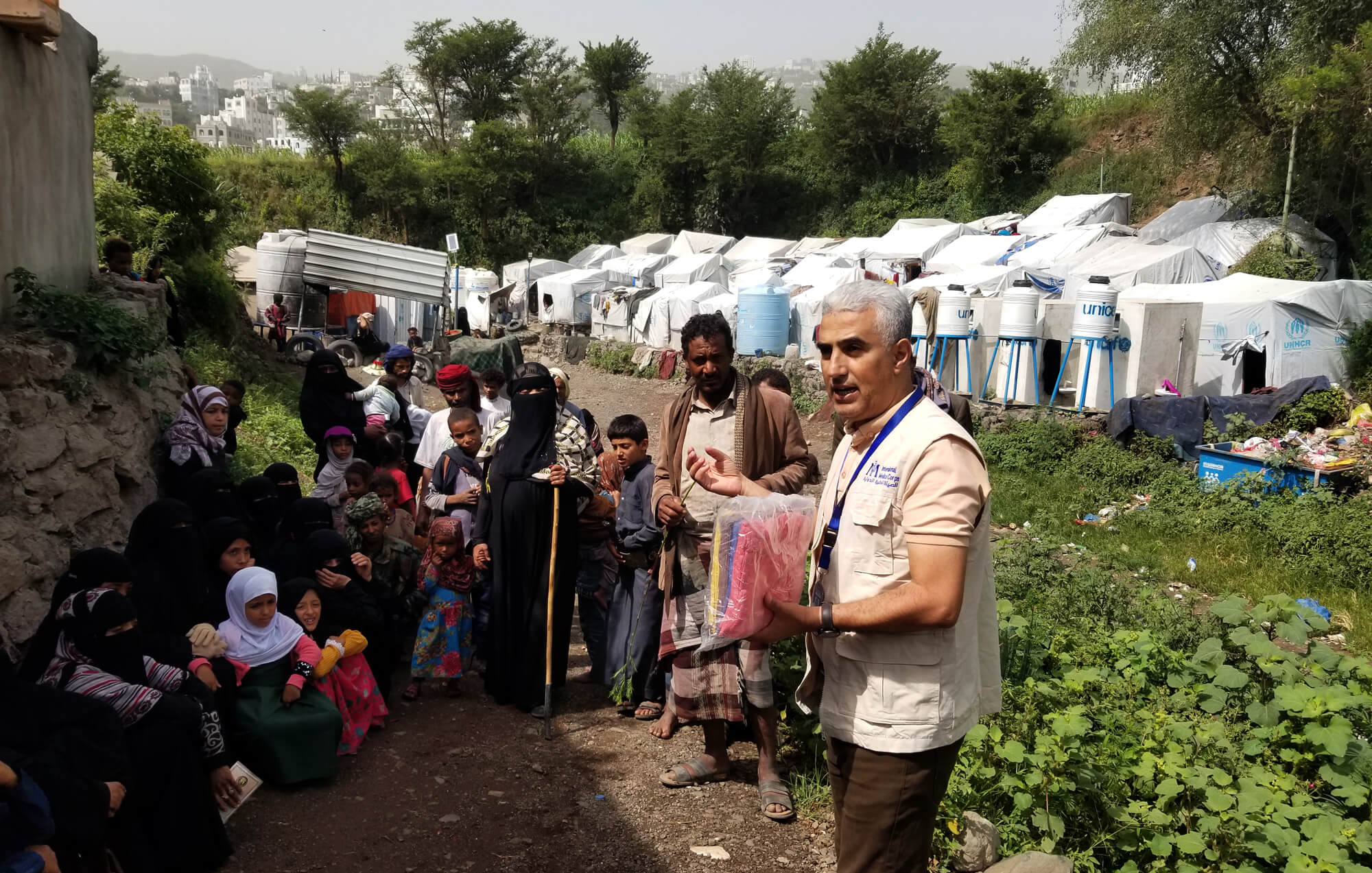 Esmail conducts a hygiene promotion session and focus group discussion at an IDP camp.