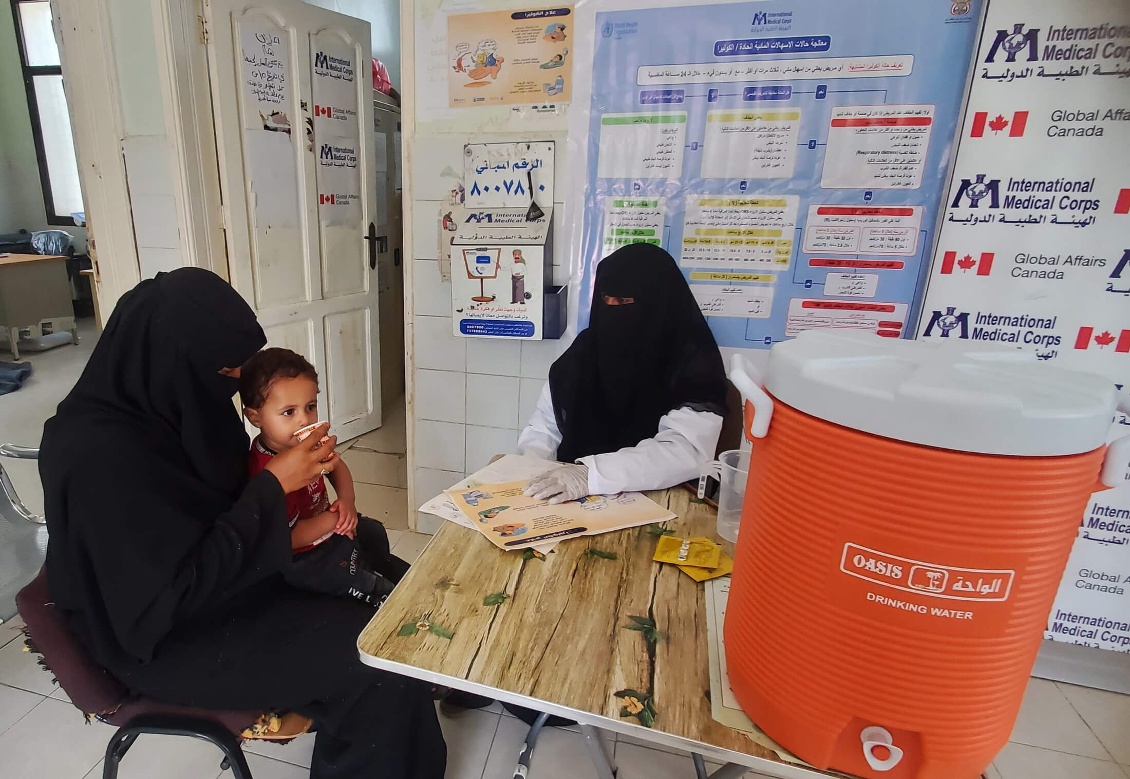 At our new oral rehydration corner in Mukideem health unit, Yemen, 2-year-old Raydan drinks rehydration solution to help prevent diarrhea-induced dehydration.
