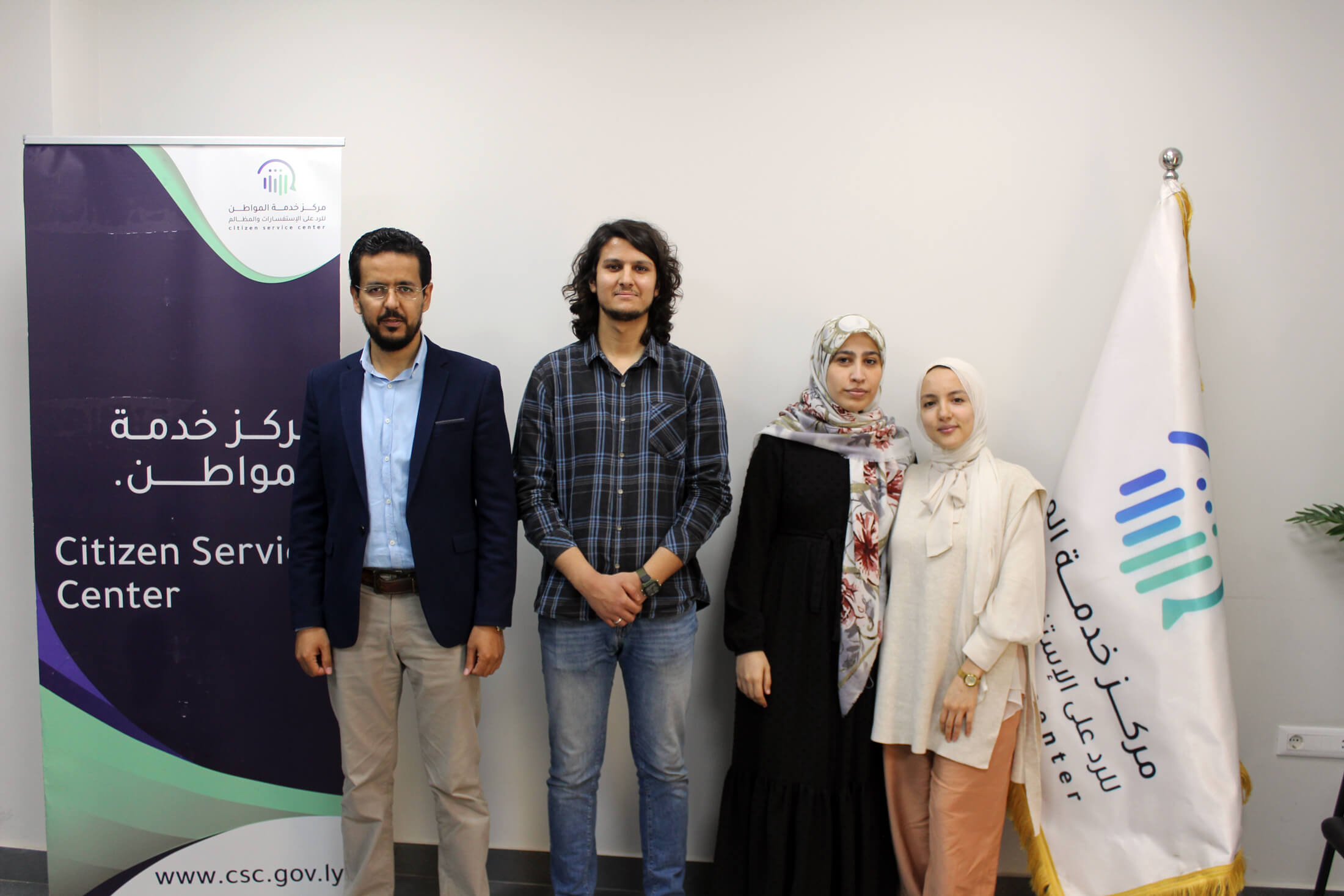 A few of our mental health counselors in Libya join Walid Alfitouri (left), Director of Administration at Citizen Service Center, for a photo.