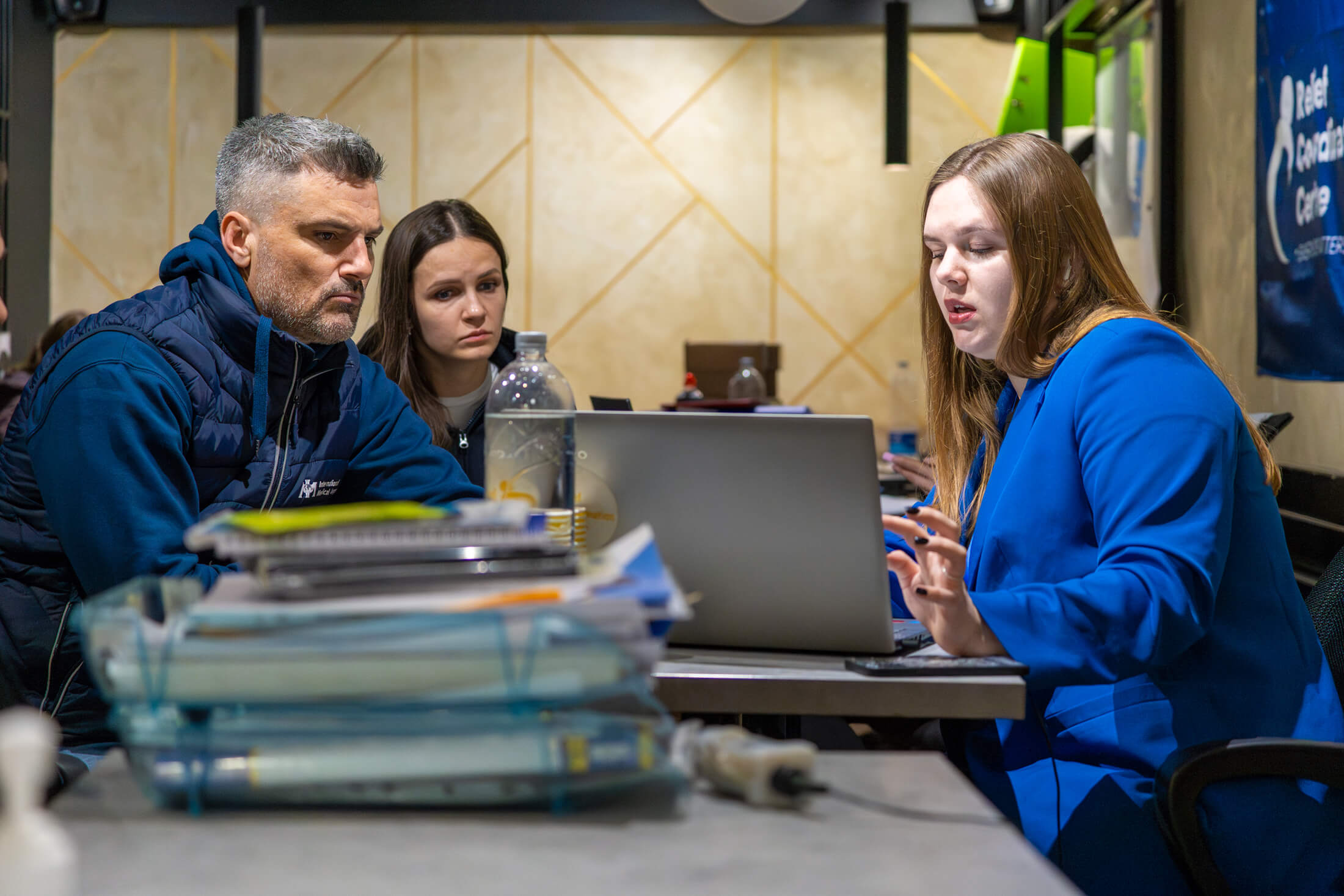 Ukraine Country Director Matthew Stearns (left) and other International Medical Corps staff meet with staff from the Relief Coordination Center to coordinate our response to the displacement crisis in Kharkiv.