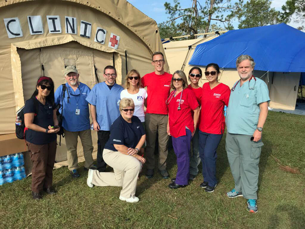 Dr. Wright (far right) with an International Medical Corps team responding to Hurricane Michael in Florida in 2018.