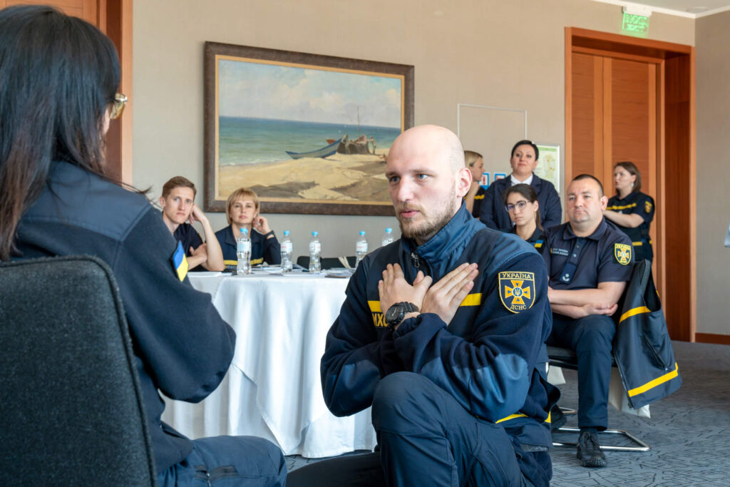 Yevhen Pushko, a psychologist with Ukraine’s State Emergency Services in Poltavska, tries a relaxation technique during an mhGAP Training of Trainers and Supervisors course.