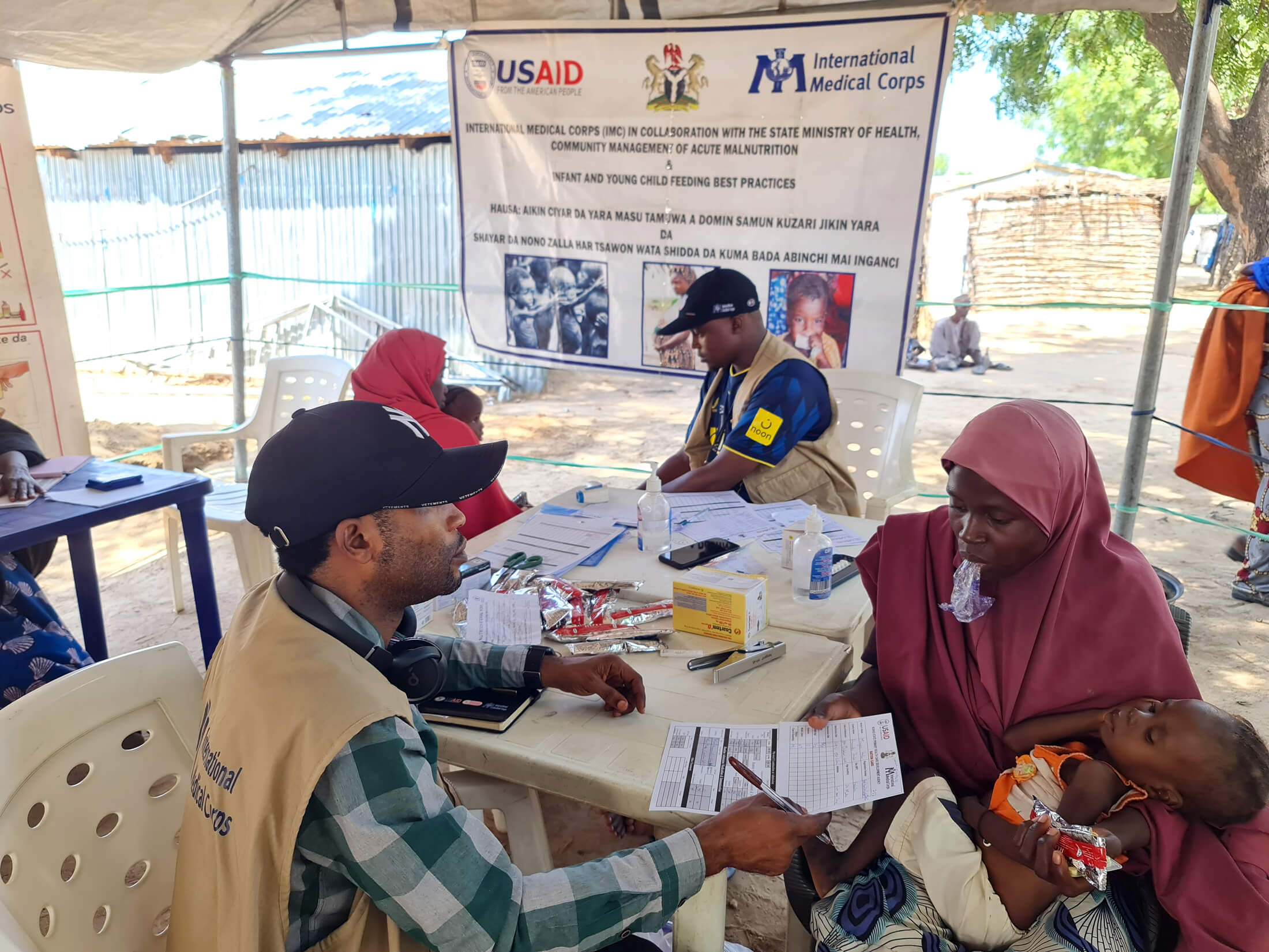 Moses engages with community members in Damboa, Nigeria.