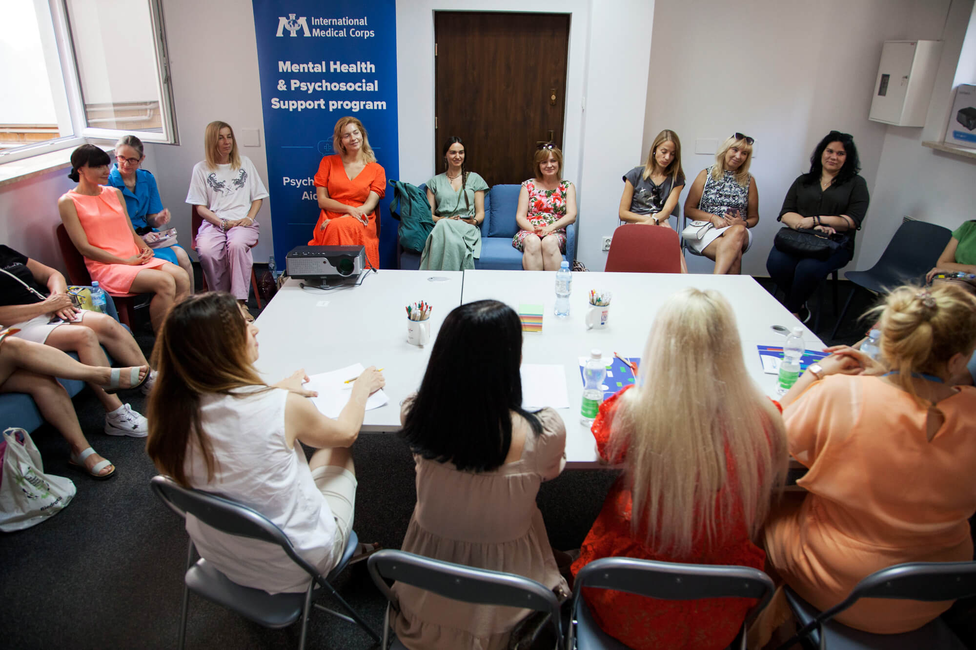 At the International Medical Corps Women’s Center in Warsaw, our staff run a mental health and psychosocial support session for refugees.