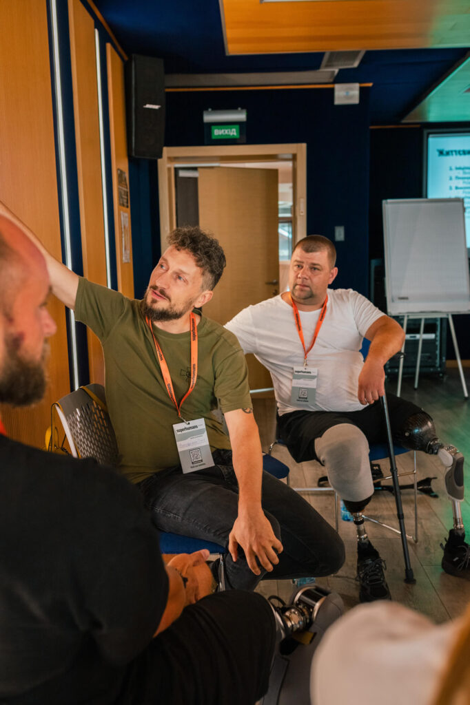 Volodymyr (center) established an acting course for other veterans after he was injured on the frontline.