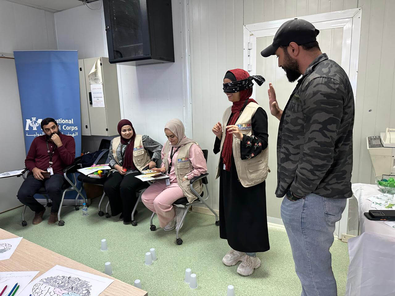 Staff from International Medical Corps and other NGOs working in Azraq refugee camp participate in mental health workshops.