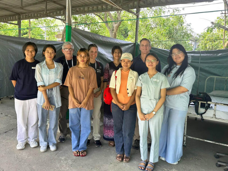 Some members of International Medical Corps’ Emergency Response Team pose with local staff at our mobile field hospital northeast of Nay Pyi Taw, Myanmar.