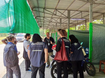 International Medical Corps staff members consult with representatives from the World Health Organization about our work in Myanmar.