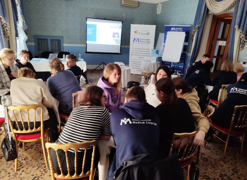 Staff members in Dnipro, Ukraine, participate in safeguarding training in February 2025.