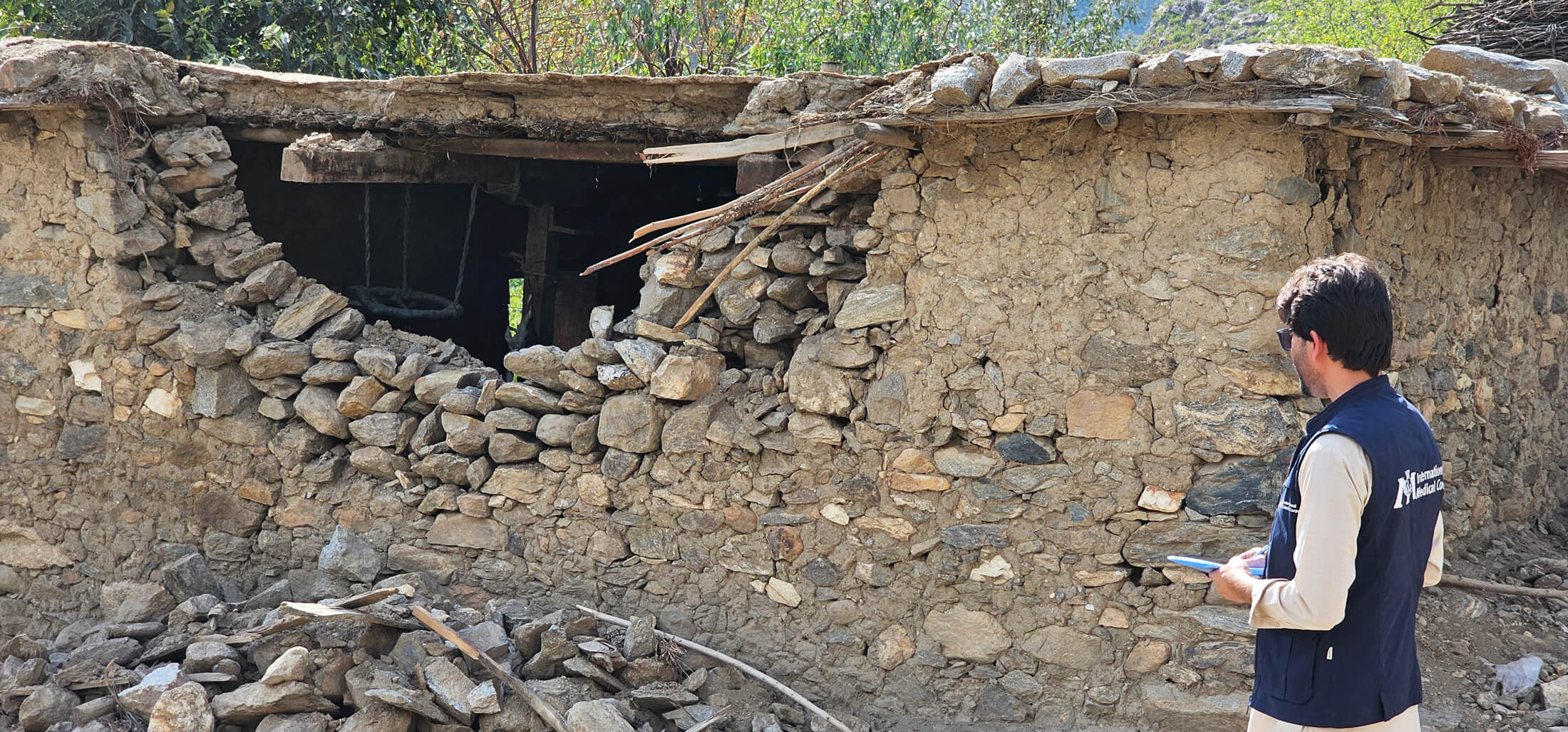An International Medical Corps staff member conducts a needs assessment in Kunar province after the devastating earthquake.