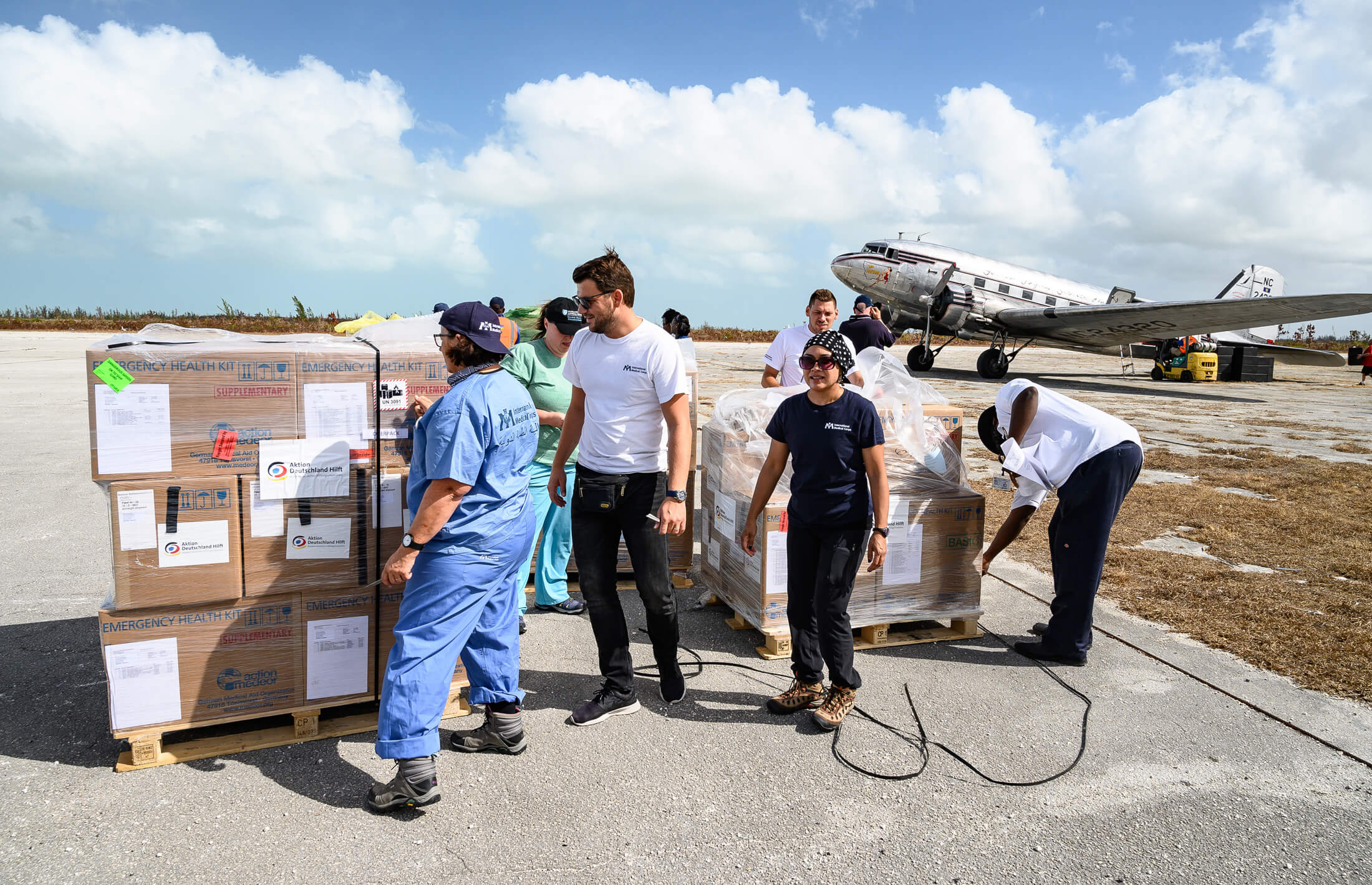 ERU members unload a shipment of emergency supplies in the Bahamas, in the wake of 2019’s Hurricane Dorian.