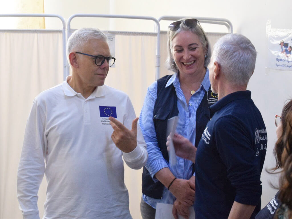 Director General of the European Commission Maciej Popowski (left) and Head of Office for Syria Michelle Cicic (center) interact with Acting Country Director Bogdan Dumitru (right) during a visit to the Misraba mobile medical team in Rural Damascus.