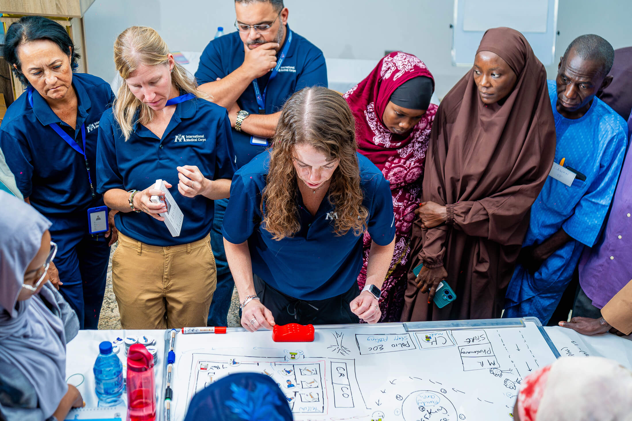 International Medical Corps trainers lead a mass casualty simulation.