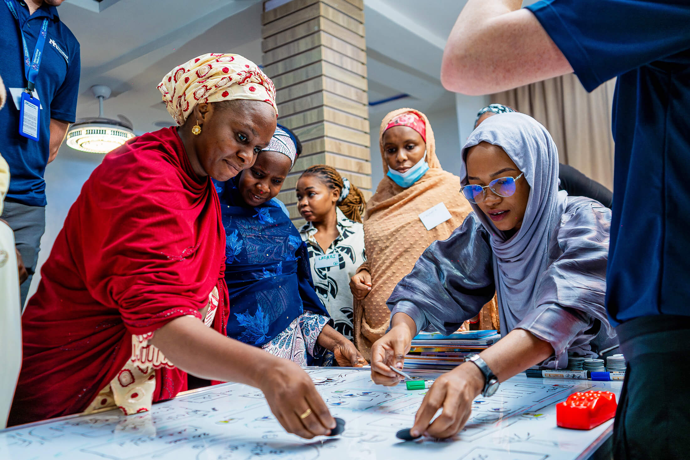 International Medical Corps trainers facilitate an emergency-scenario exercise with trainees.
