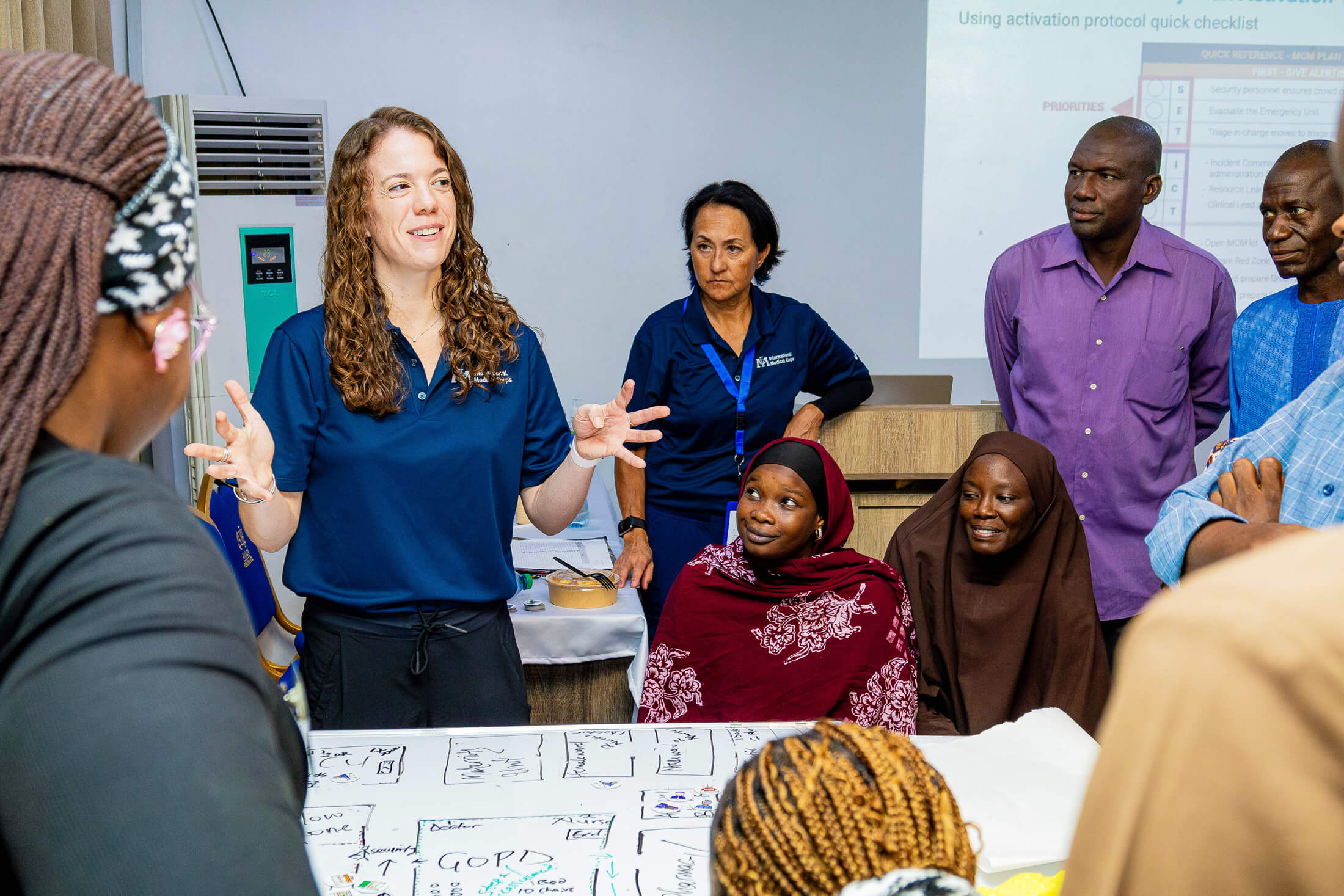 Morgan Broccoli leads participants through an emergency management strategy exercise.