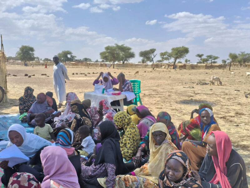 People displaced by the conflict in Sudan wait to receive mental health care from International Medical Corps staff.