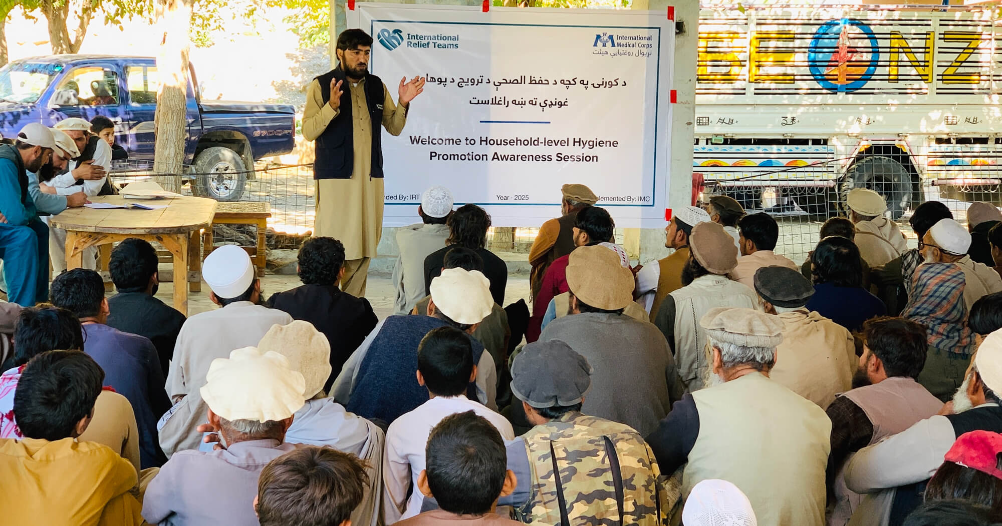 An International Medical Corps staff member leads a hygiene-awareness session in Chawkay district.