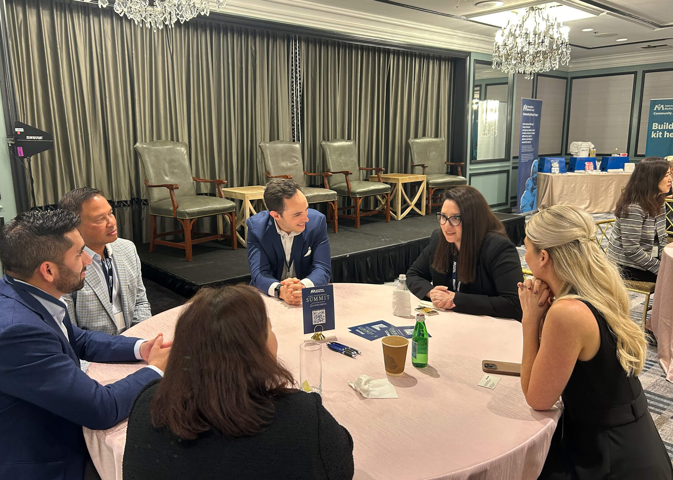 Suha (right) leads a discussion at International Medical Corps’ First Responders Summit in 2025, an event for business leaders dedicated to advancing humanitarian narratives.