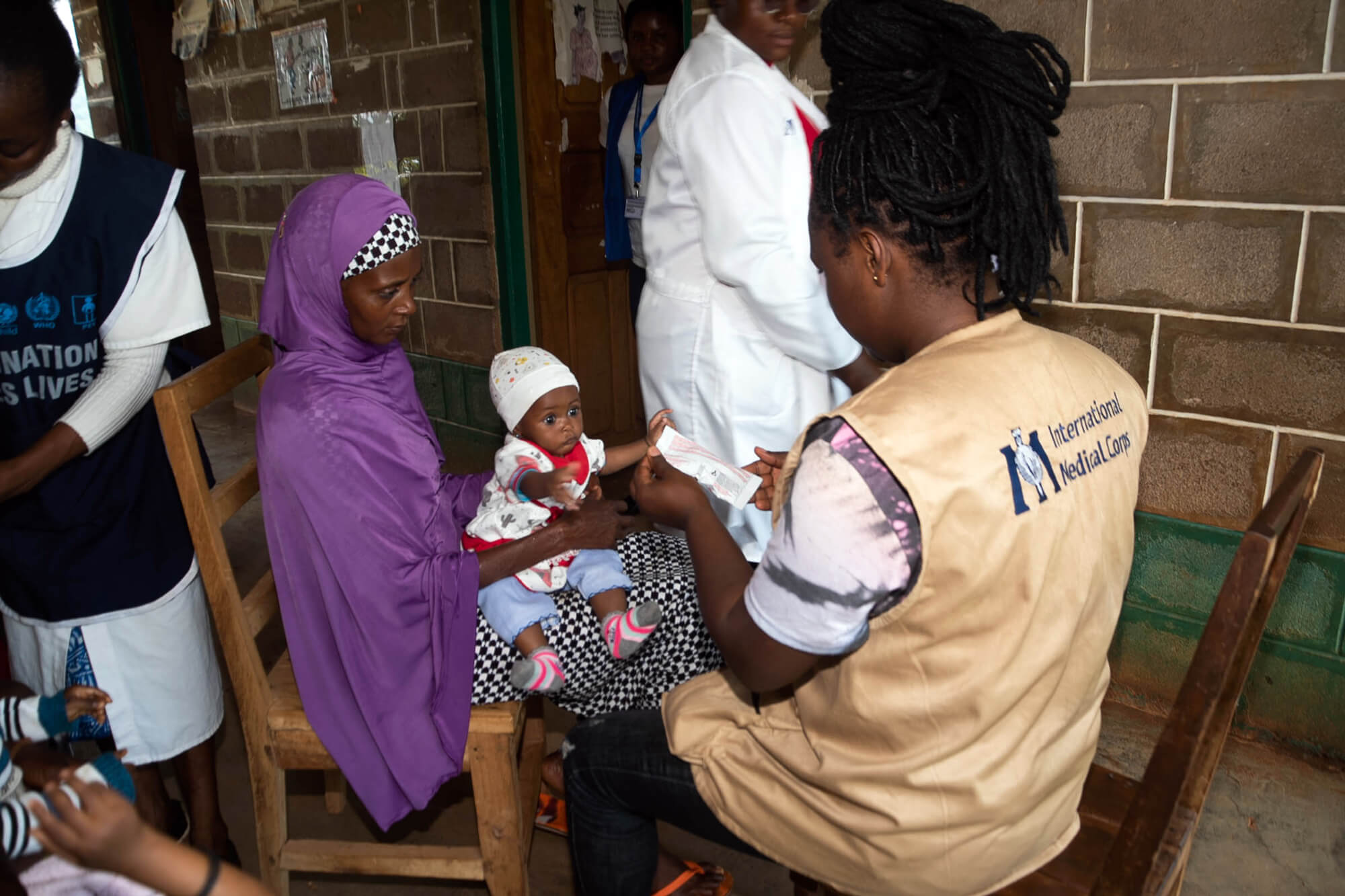 As part of our community engagement programme in Northwest Cameroon, a nutrition assistant evaluates children for malnutrition. These evaluations have led to a significant reduction in such cases across the country.