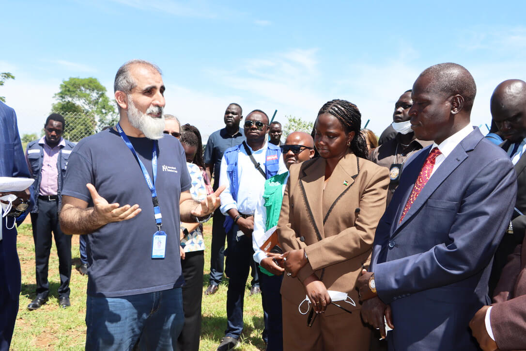 Country Director Zain ul Abedin (left) leads a high-level delegation visit by the Senior Presidential Envoy on Special Programs Hon. Adut Salva Kiir Mayardit (brown suit), South Sudan Minister of Health Hon. Luke Thompson Thoan (blue suit), NPHI leadership and other partners to the IDU facility in Juba.