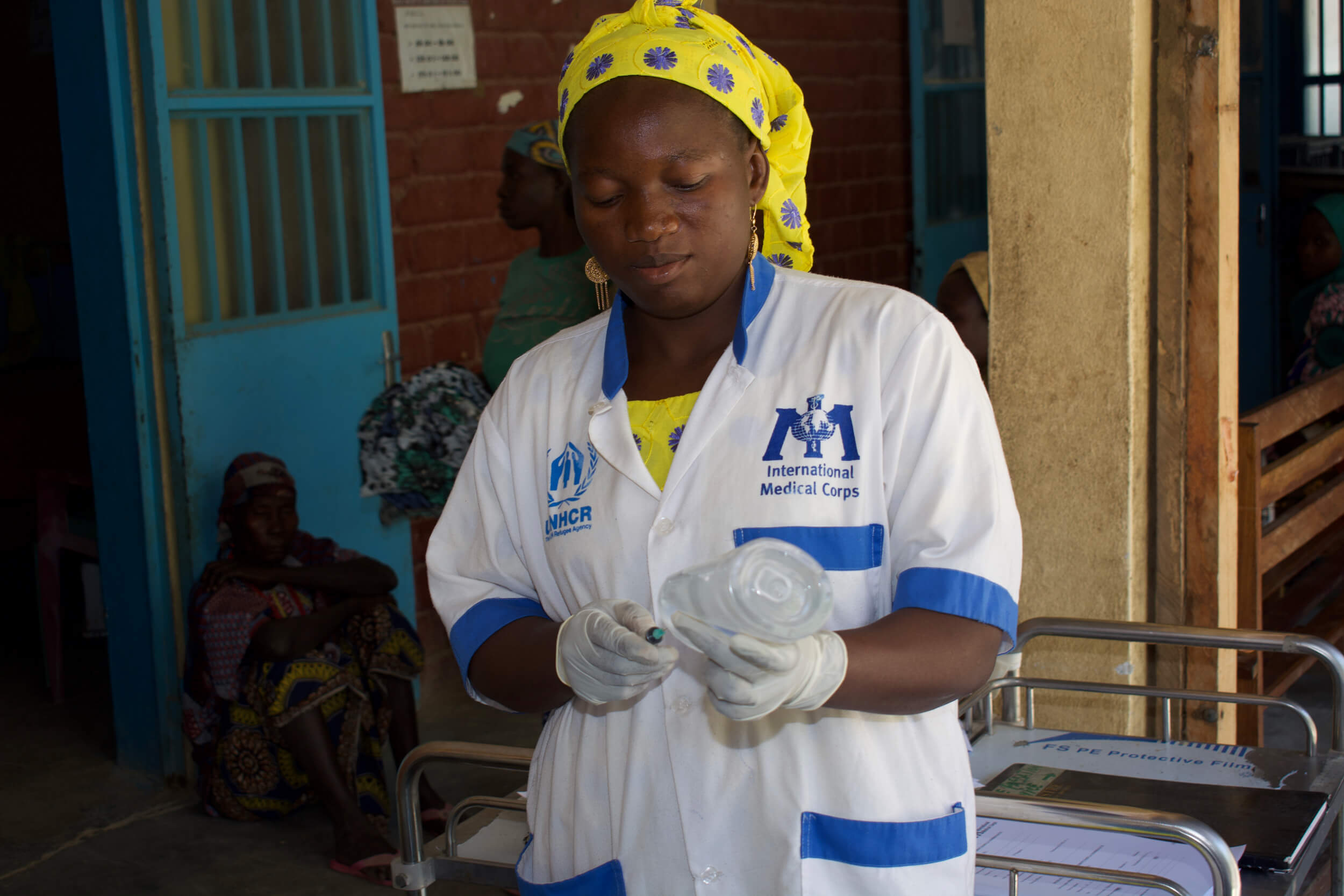 An International Medical Corps nurse prepares a cholera vaccine in Cameroon.