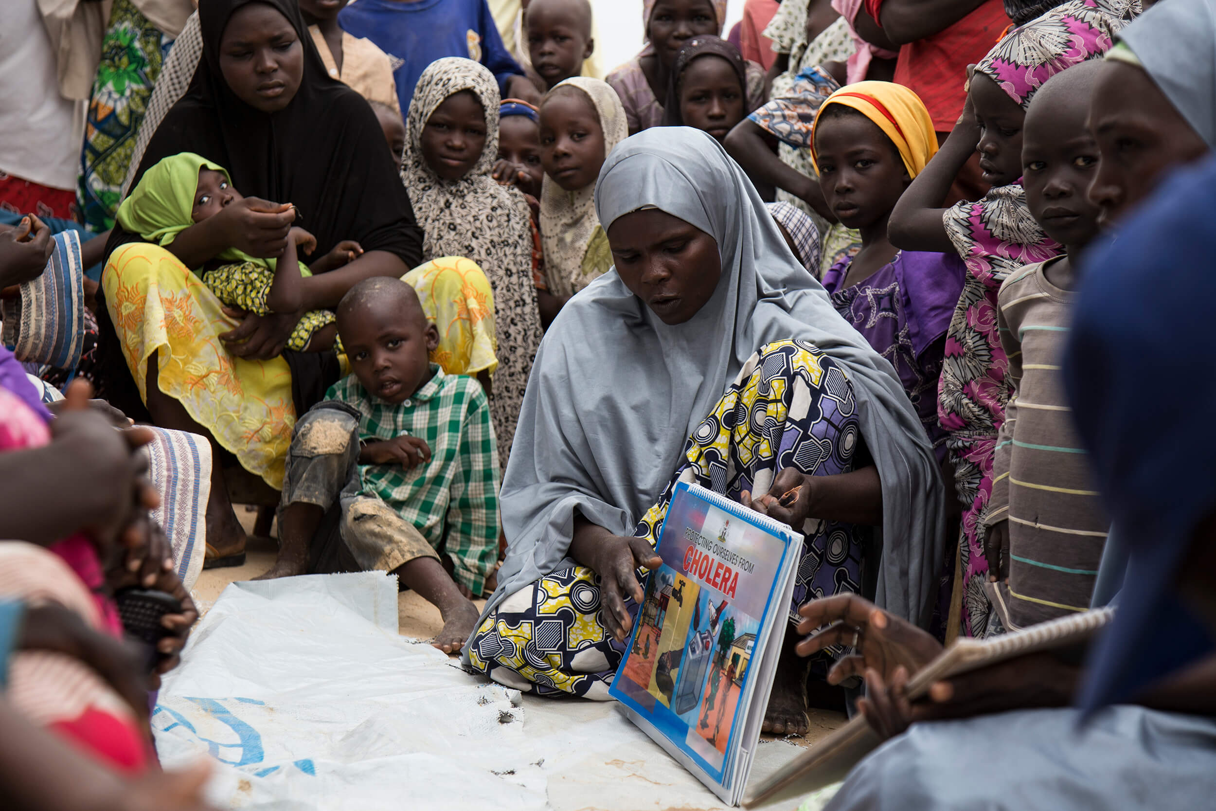 An International Medical Corps hygiene promoter conducts an education session in Bakassi camp, Nigeria.
