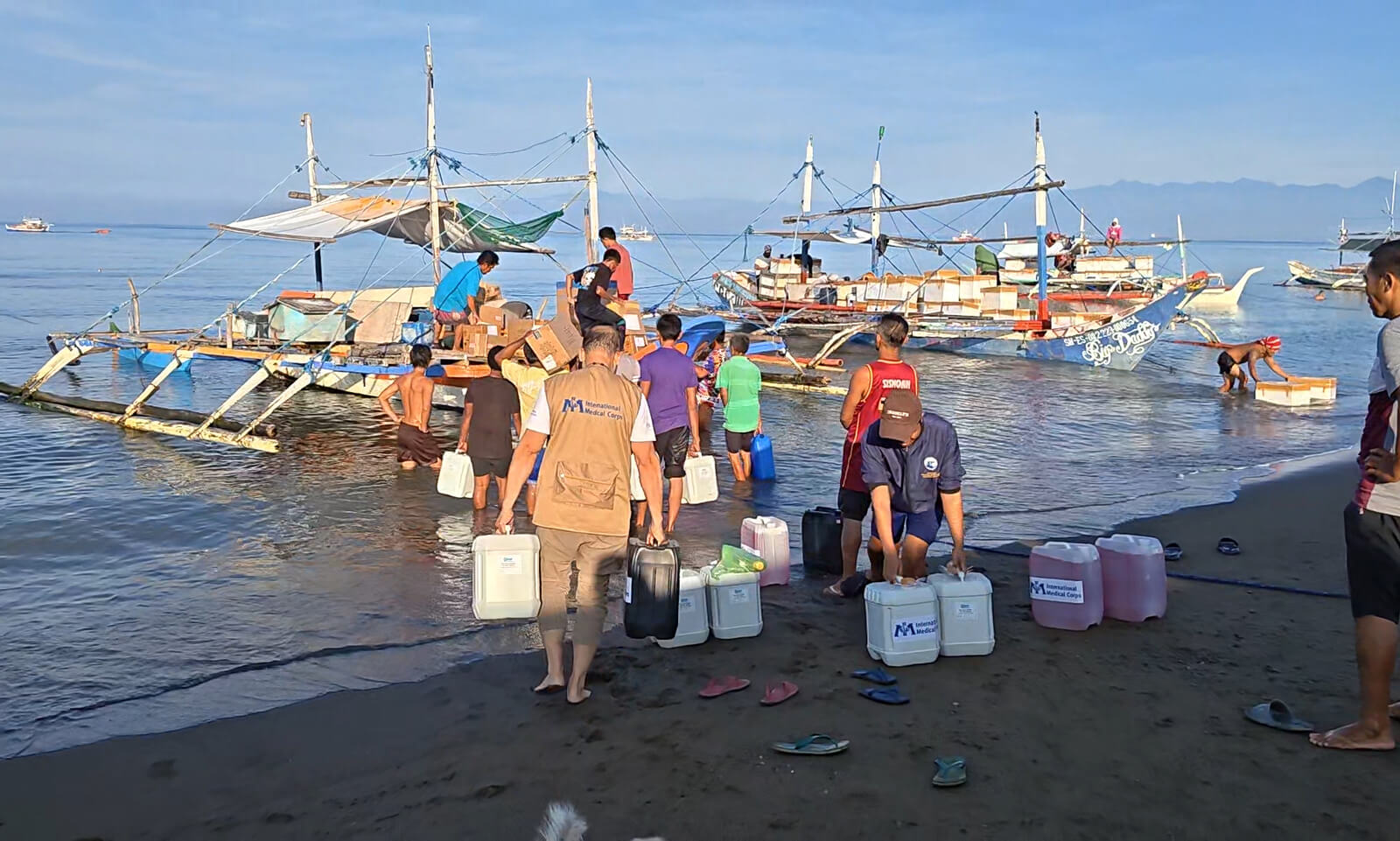 International Medical Corps staff and community partners load medicines, medical supplies and generators for transport to rural health units and health facilities in Sarangani province, Philippines.
