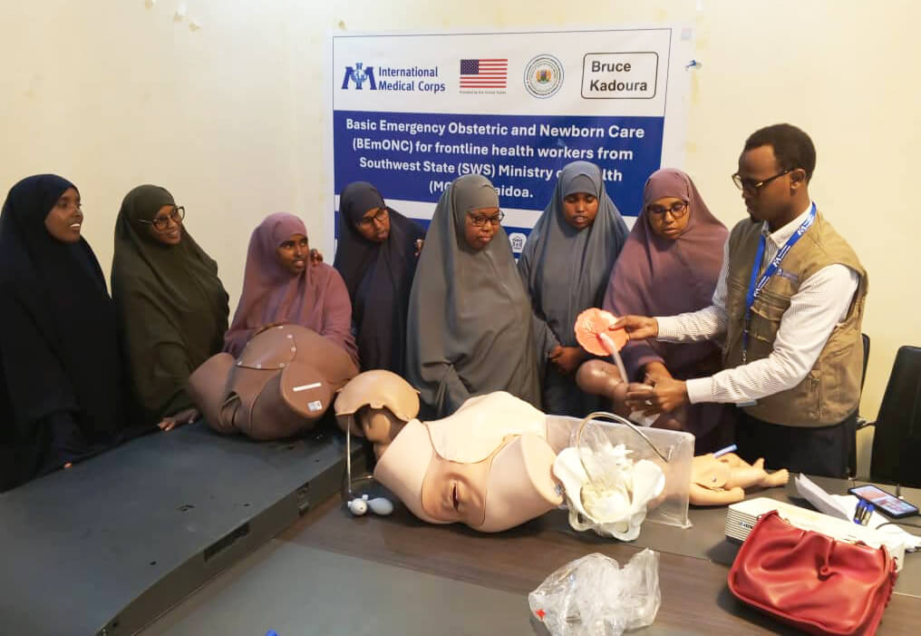 Dr. Ahmed Omar Mohamed leads a training session with midwives and midwife assistants at Suuqa Xoolaha Health Center.
