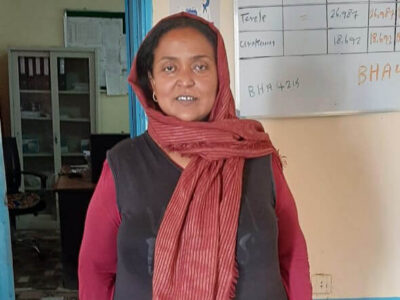 Dr. Saadeldeen stands in the Zalingei office, 15 days before fighting erupted in April 2023. The office was looted and partially burned soon after this photo was taken.