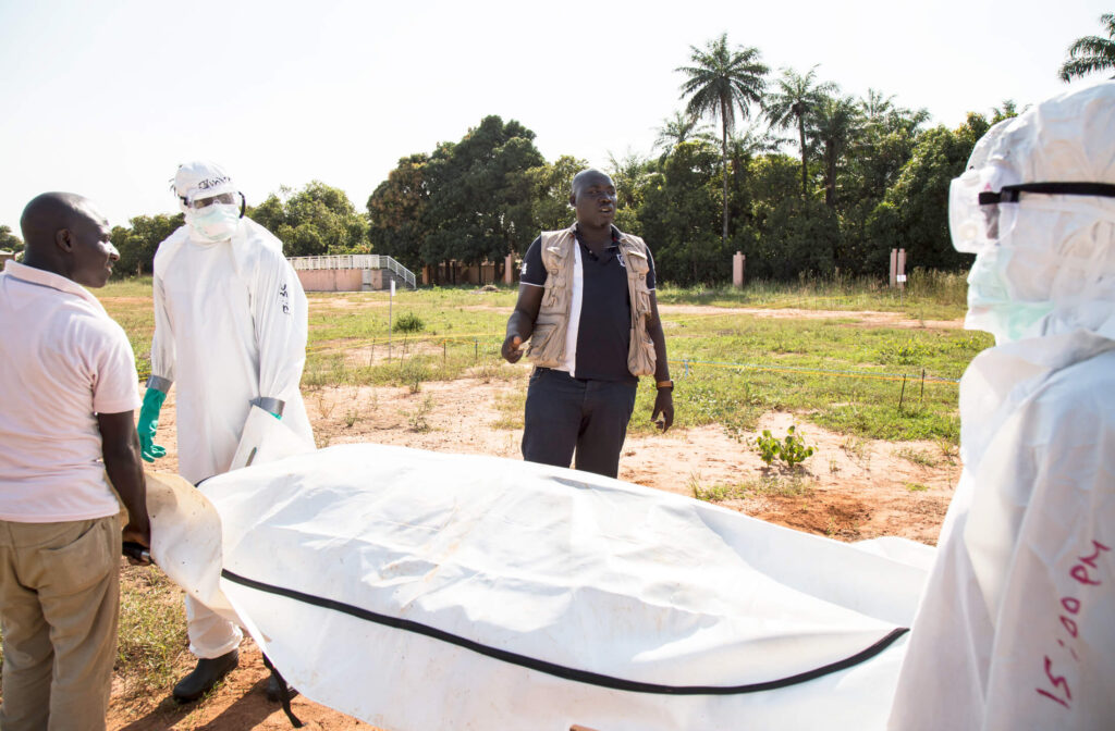 After a five-day training programme, participants practice what they have learned about safe and dignified burials in Guinea-Bissau in 2015.