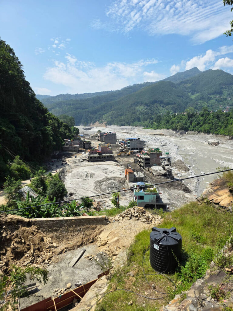 Destruction along a river at Trishuli Bazaar, Nepal.